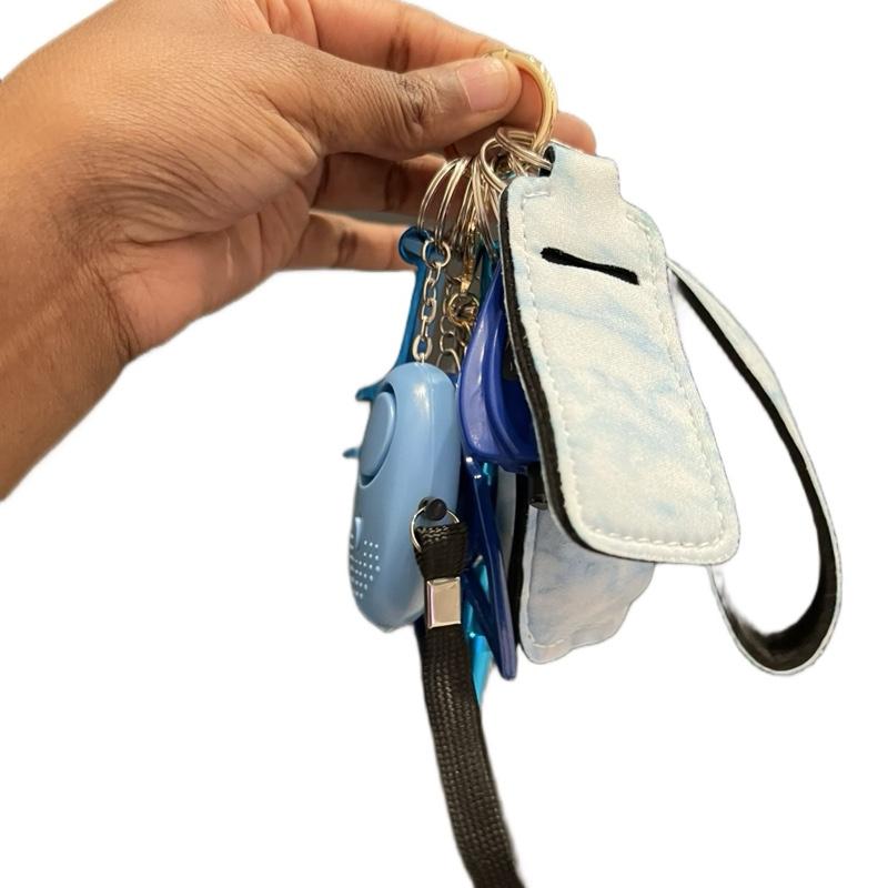 Keychain Set w/ Alarm, Pompom, Chapstick Holder, Sanitizer or Lotion Bottle and Holder, Bottle Opener, Window Breaker, Escape Stick, Wristlet, and a Cat!