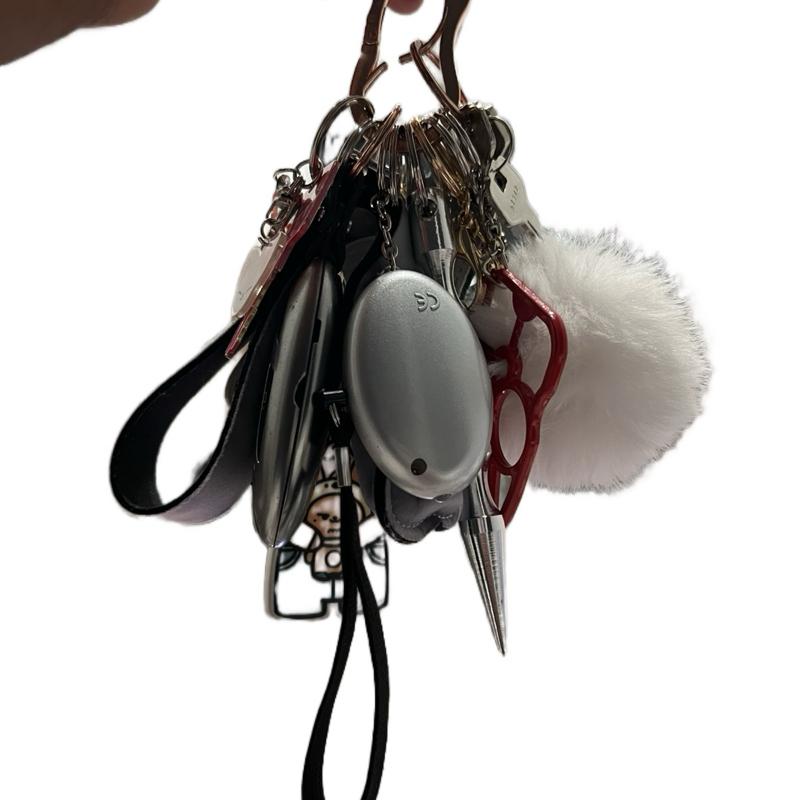 Keychain Set w/ Alarm, Pompom, Chapstick Holder, Sanitizer or Lotion Bottle and Holder, Bottle Opener, Window Breaker, Escape Stick, Wristlet, and a Cat!